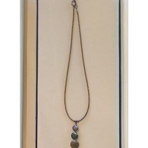 3 iridescent glass beads on brown beaded chain